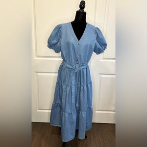 Given Kale blue jean dress ruffle sleeves.